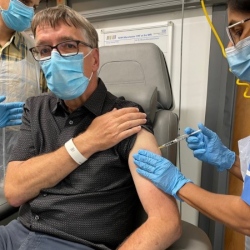 Man getting vaccine.