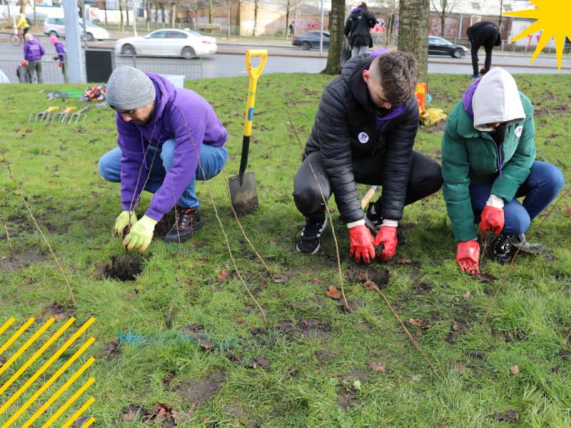 Students doing gardening volunteer work