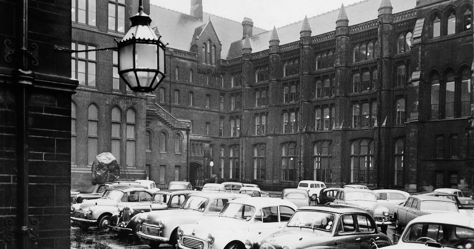 An old image of cars in the Front Quad.
