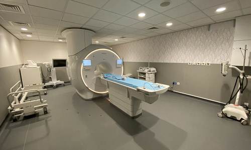 An MRI machine in a big, empty room